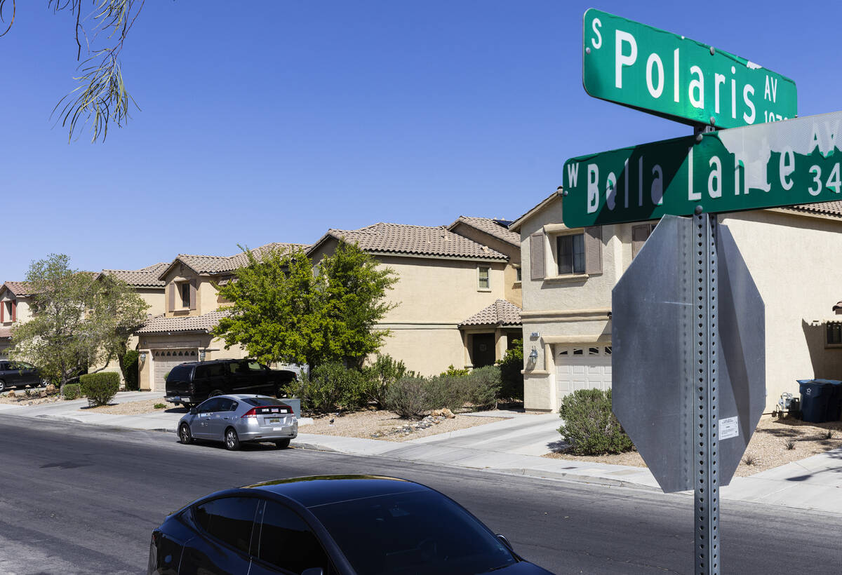 A neighborhood where a woman was fatally shot Sunday night while walking near Southern Highland ...