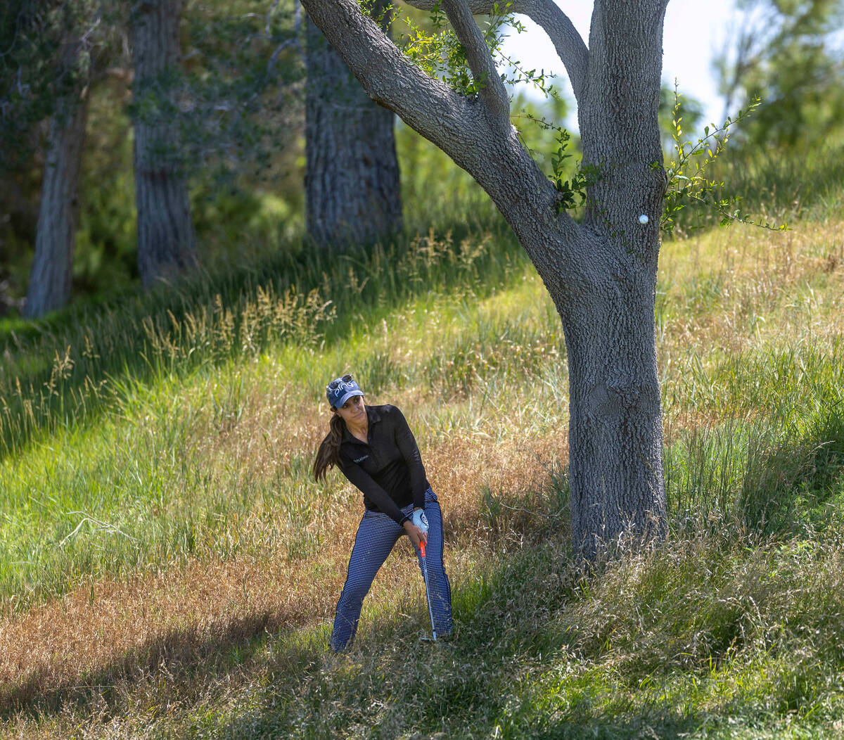 Paula Reto digs out of the grass on hole 7 during the third day of Bank of Hope LPGA Match Play ...