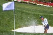 Celine Boutier wedges out of the sand onto the green at hole 9 during the third day of Bank of ...