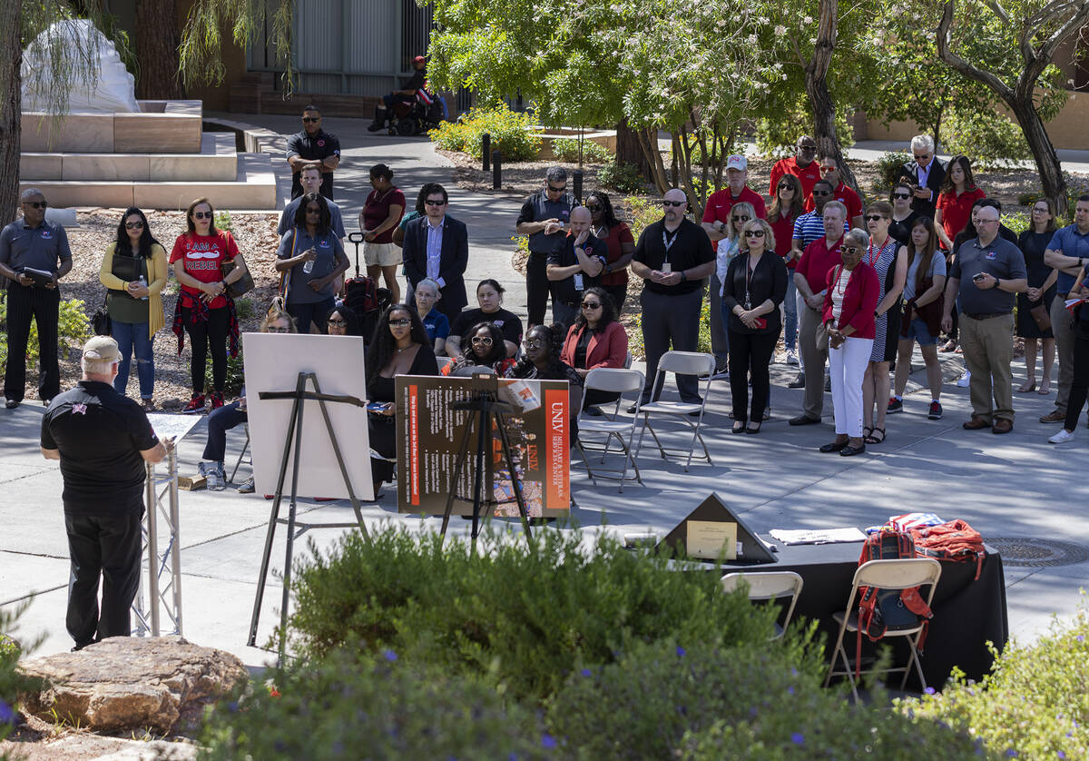 People gather for a Memorial Day ceremony at the UNLV Veterans Memorial on campus, on Friday, M ...