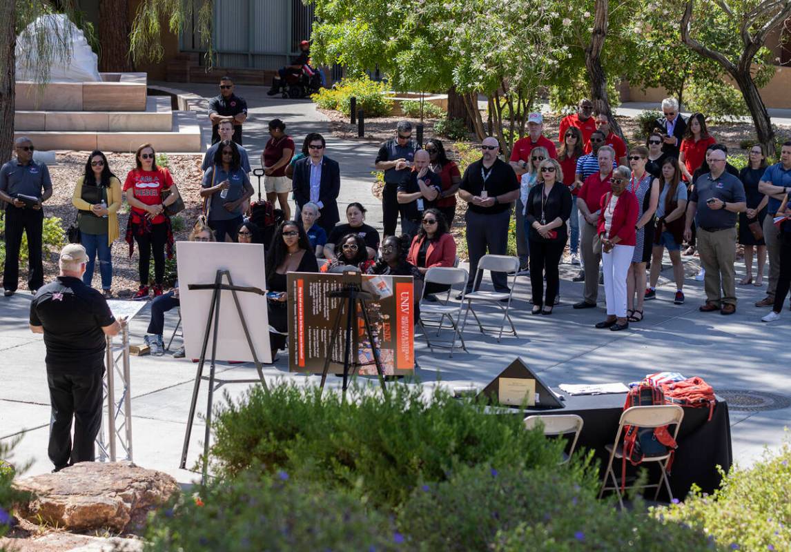People gather for a Memorial Day ceremony at the UNLV Veterans Memorial on campus, on Friday, M ...