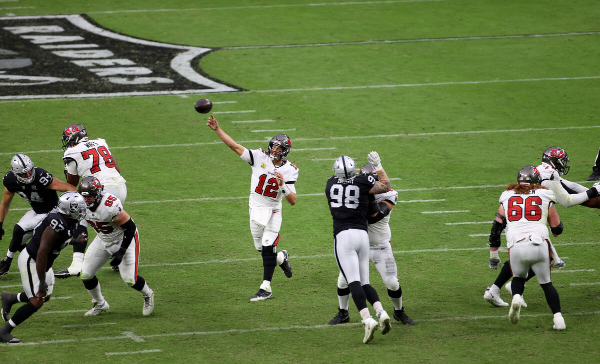 Tampa Bay Buccaneers quarterback Tom Brady (12) throws against Las Vegas Raiders in the third q ...