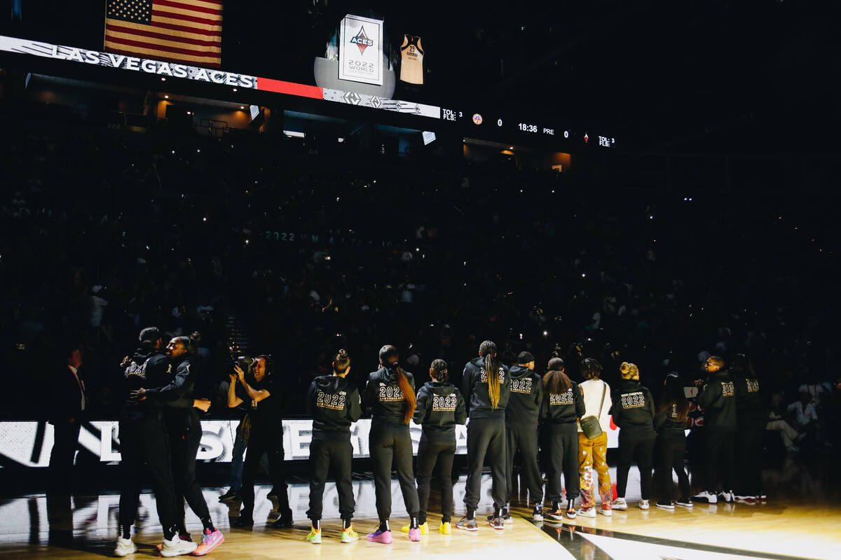 The Aces clap as the 2022 WNBA championship banner is unveiled on Saturday, May 27, 2023, at th ...