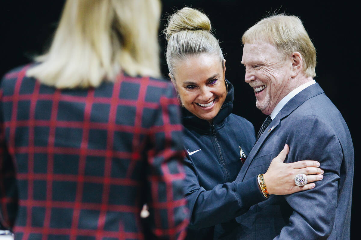 Becky Hammon receives her championship ring from Las Vegas Aces owner Mark Davis on Saturday, M ...