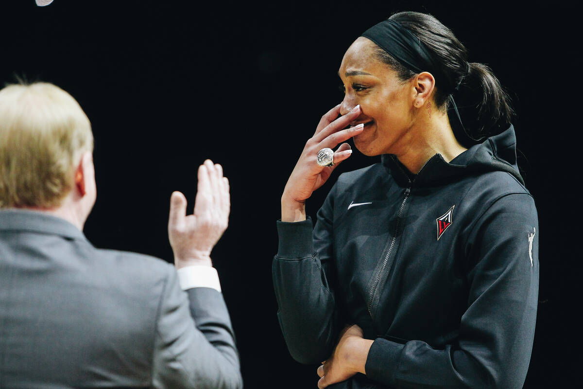 Las Vegas Aces owner Mark Davis claps for Aces center A’ja Wilson as she receives her ch ...