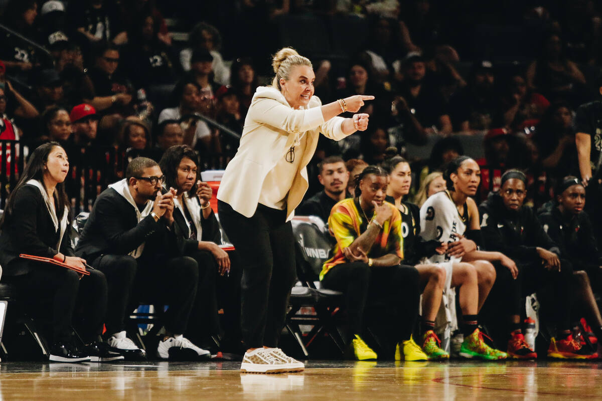La Vegas Aces coach Becky Hammon coaches from the sidelines during a game against the Los Angel ...