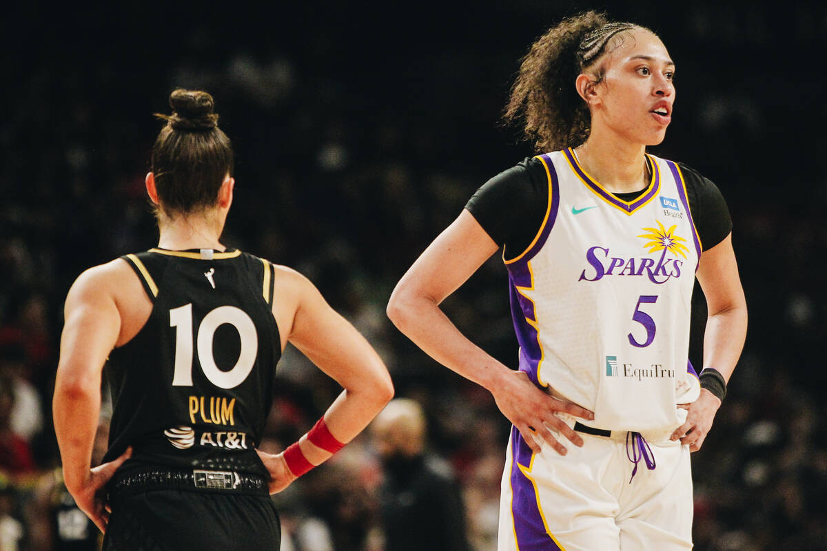 Los Angeles Sparks forward Dearcia Hamby (5) stands idle during a dead ball next to her former ...