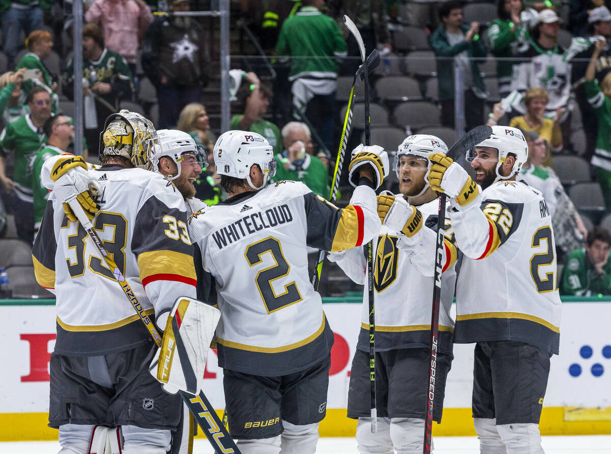 Golden Knights players celebrate on the ice after defeating the Dallas Stars 6-0 during Game 6 ...