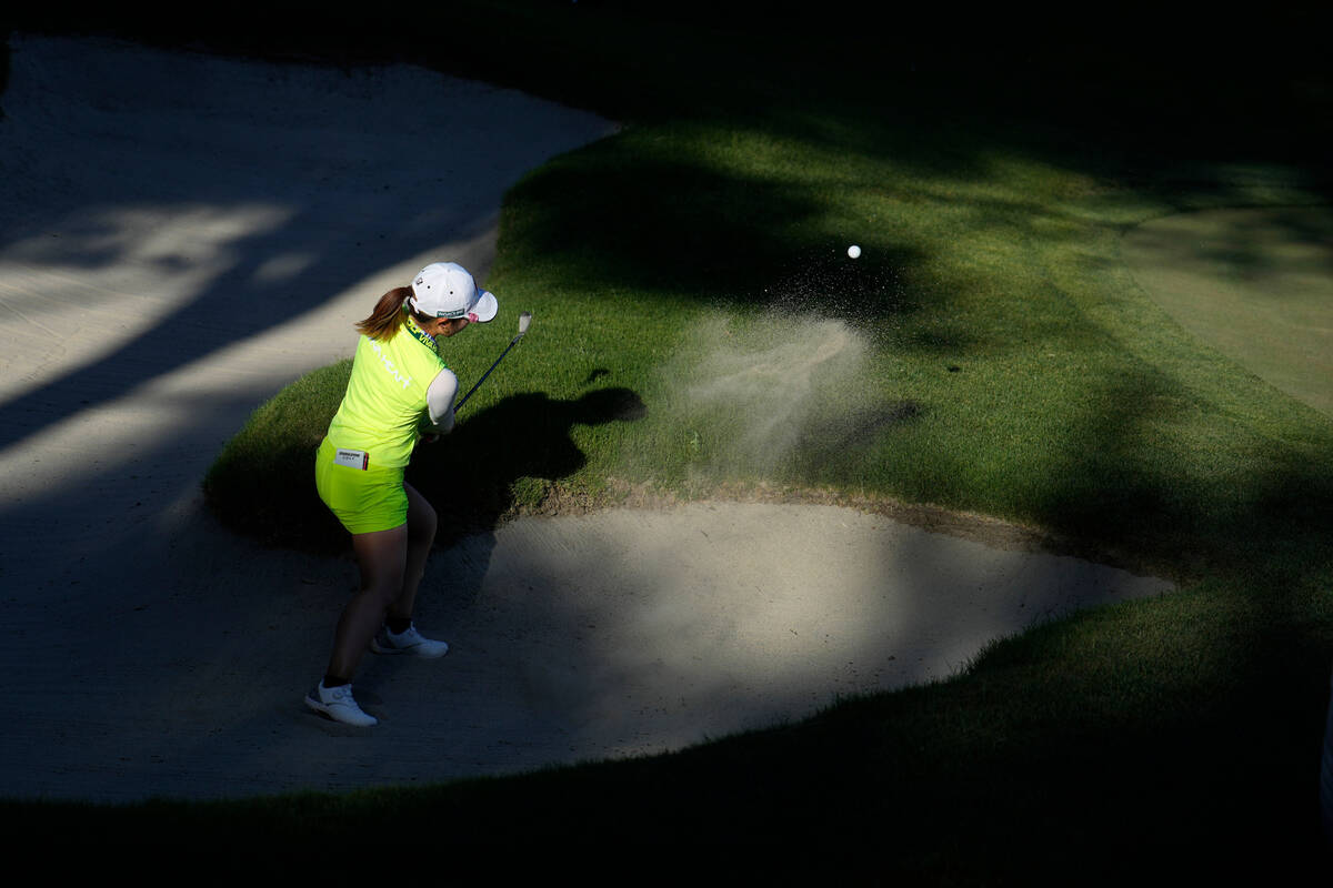 Ayaka Furue hits out of a bunker at the 17th green during the final round of the LPGA Bank of H ...