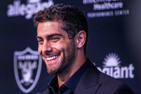 Jimmy Garoppolo laughs from a question during a press conference at the Raiders Headquarters an ...