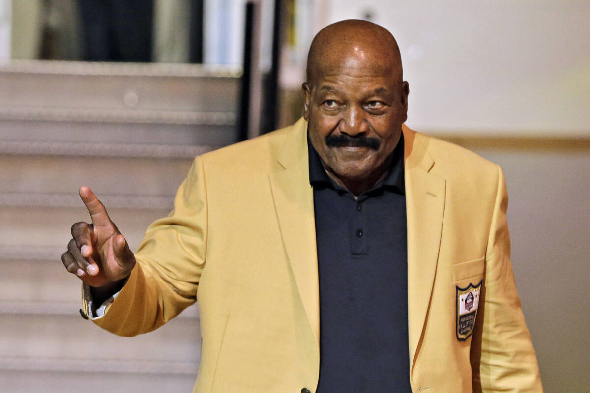FILE - Jim Brown is introduced before the inaugural Pro Football Hall of Fame Fan Fest Friday, ...