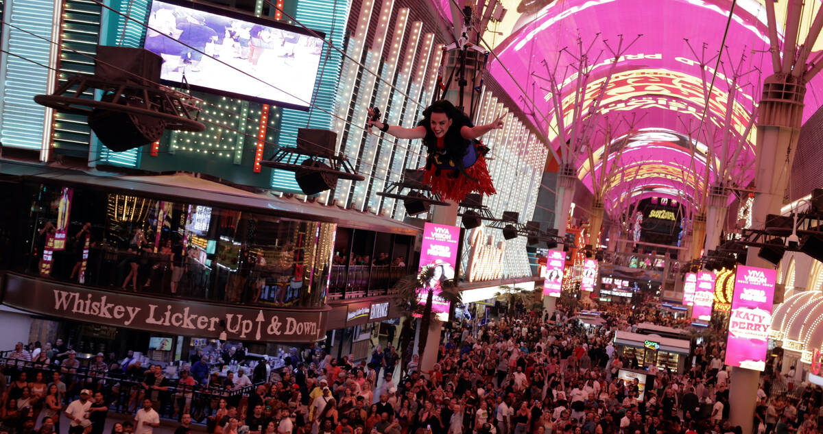 Pop star and Resorts World Theater headliner Katy Perry flies across the Fremont Street Experie ...