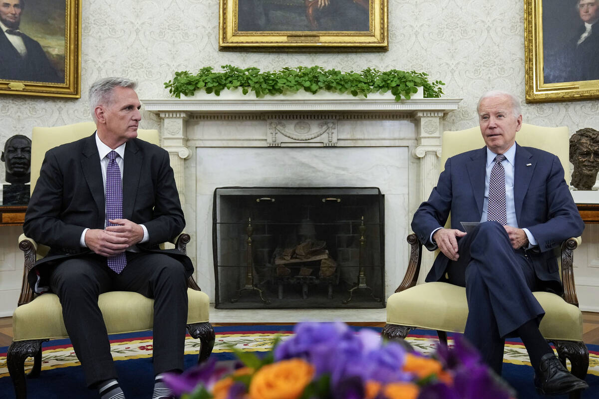 FILE - President Joe Biden meets with House Speaker Kevin McCarthy of Calif., to discuss the de ...