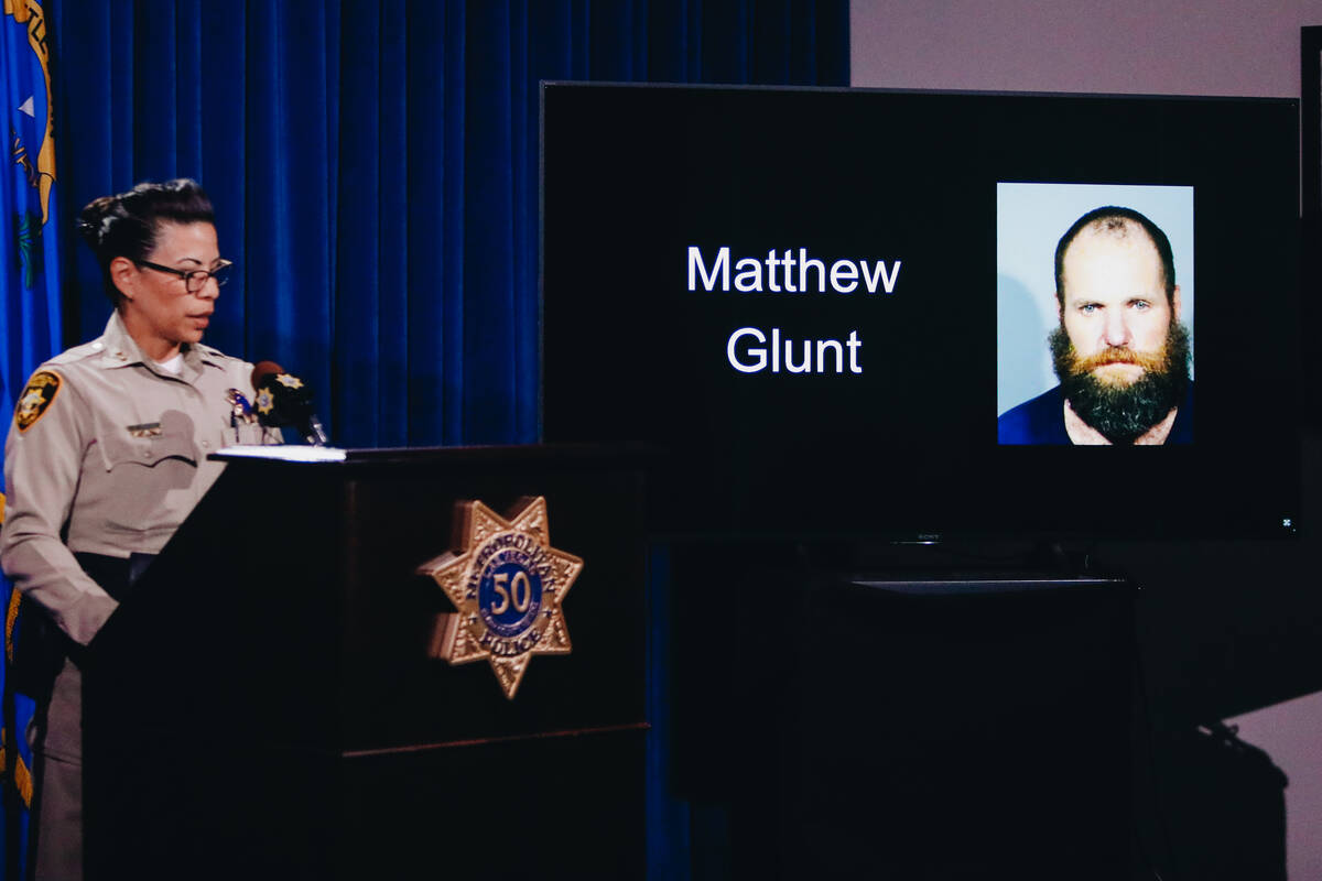 Assistant Sheriff Yasina Yatomi shows Matthew Glunt’s mugshot during a press briefing on ...
