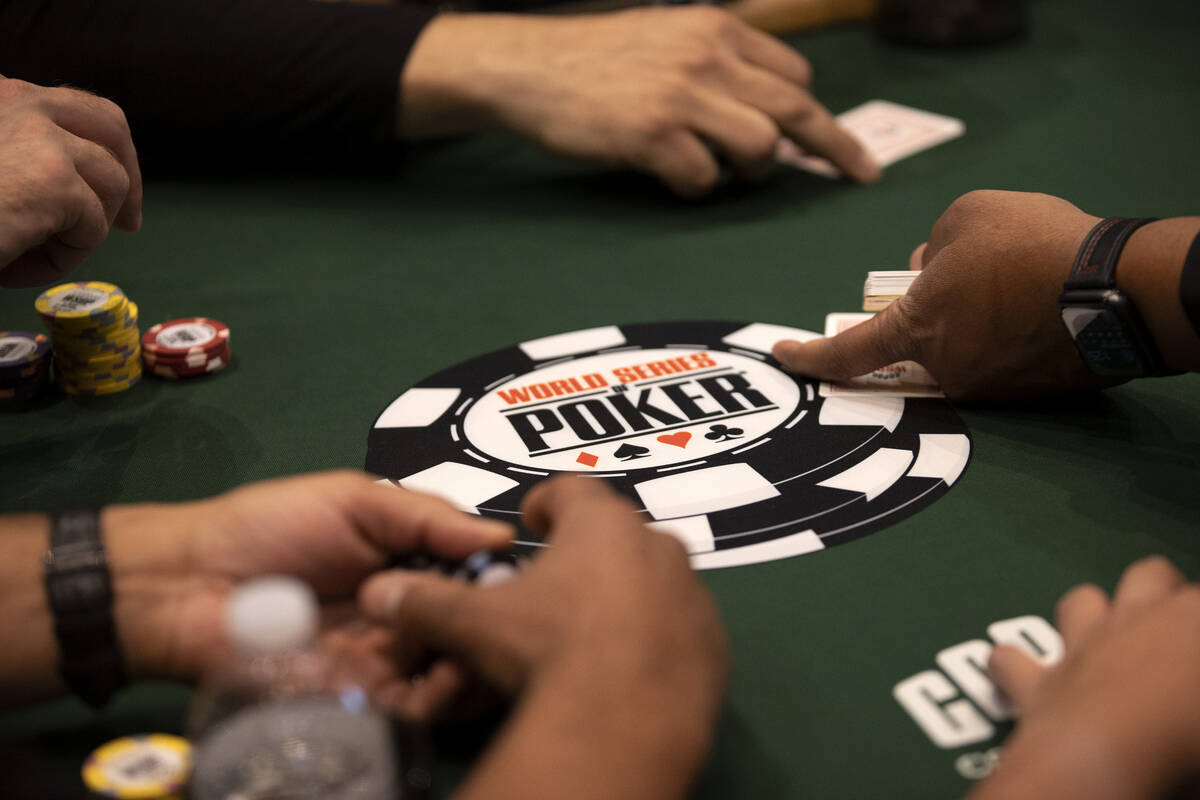 Players are dealt their cards during the first day of the World Series of Poker at Horseshoe La ...