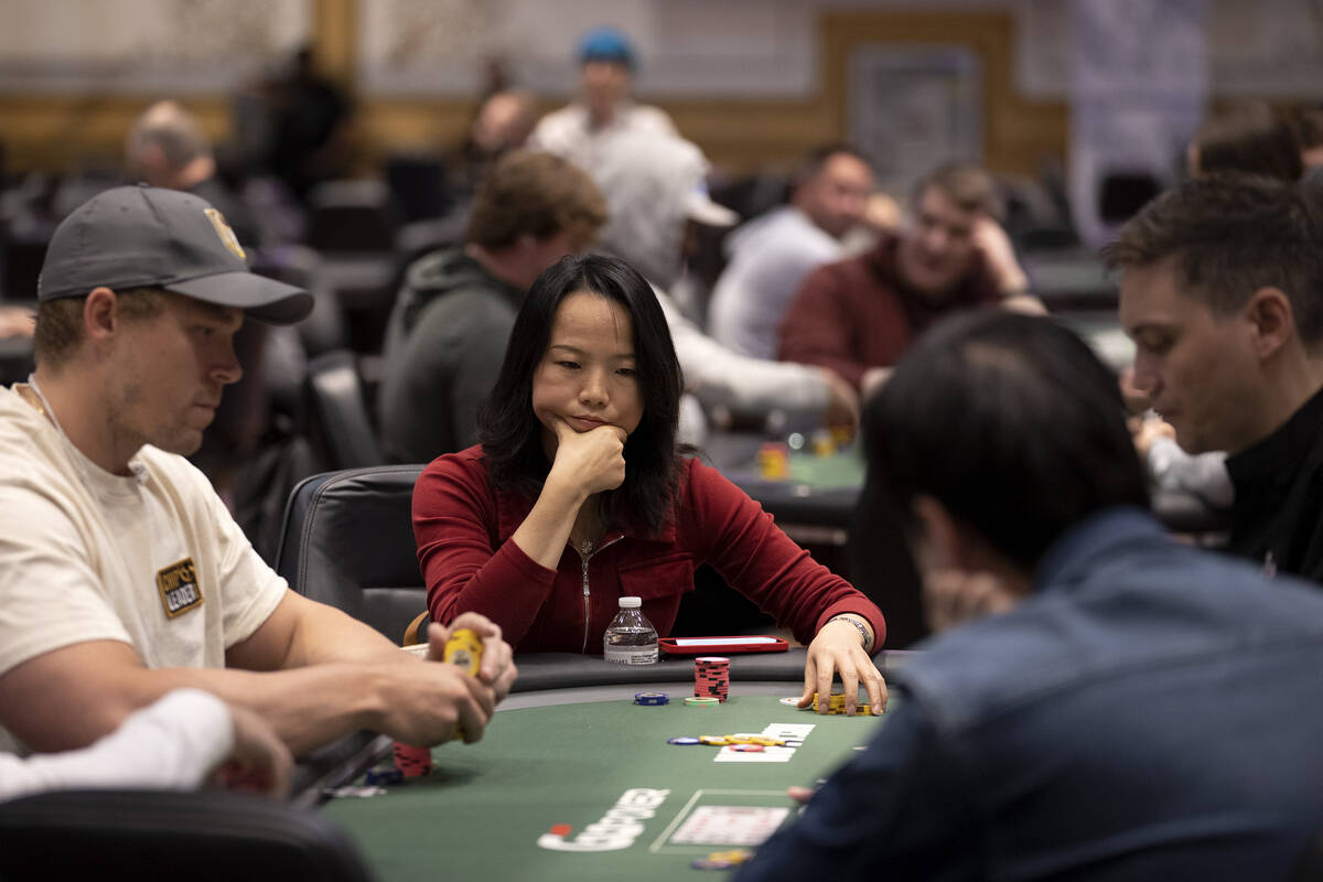 A player considers their turn during the first day of the World Series of Poker at Horseshoe La ...