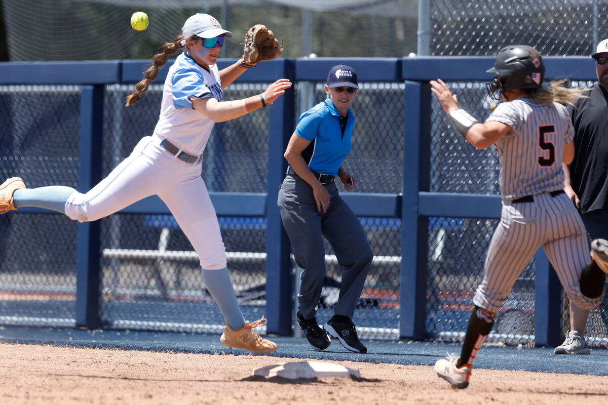 Centennial's infielder Carmella Korte missed the ball and unable to tag out Douglas' Ava Delane ...