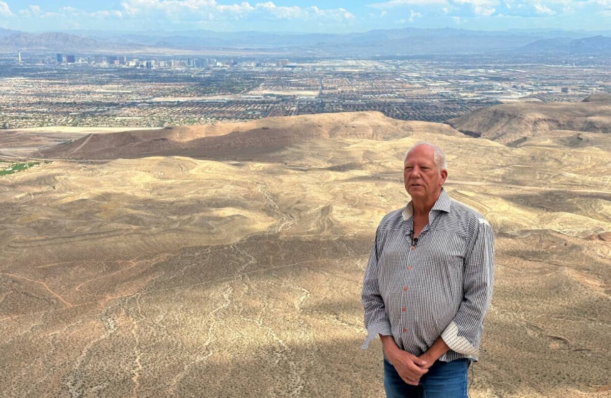 Developer Jim Rhodes shows a view of the Las Vegas Valley from his Blue Diamond Hill Gypsum Min ...