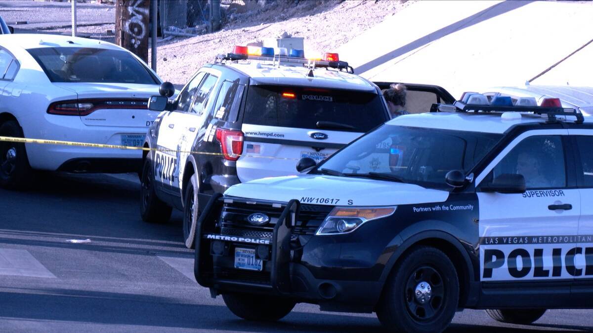 Las Vegas police officers investigate the scene of a fatal stabbing on Tuesday, May 30, 2023, a ...