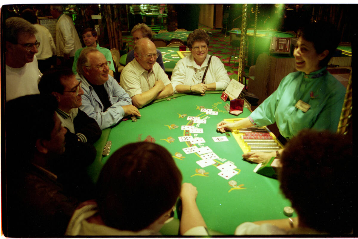 Christine Toly dealing "face-up" blackjack to tourists at the Tropicana Hotel's &quot ...