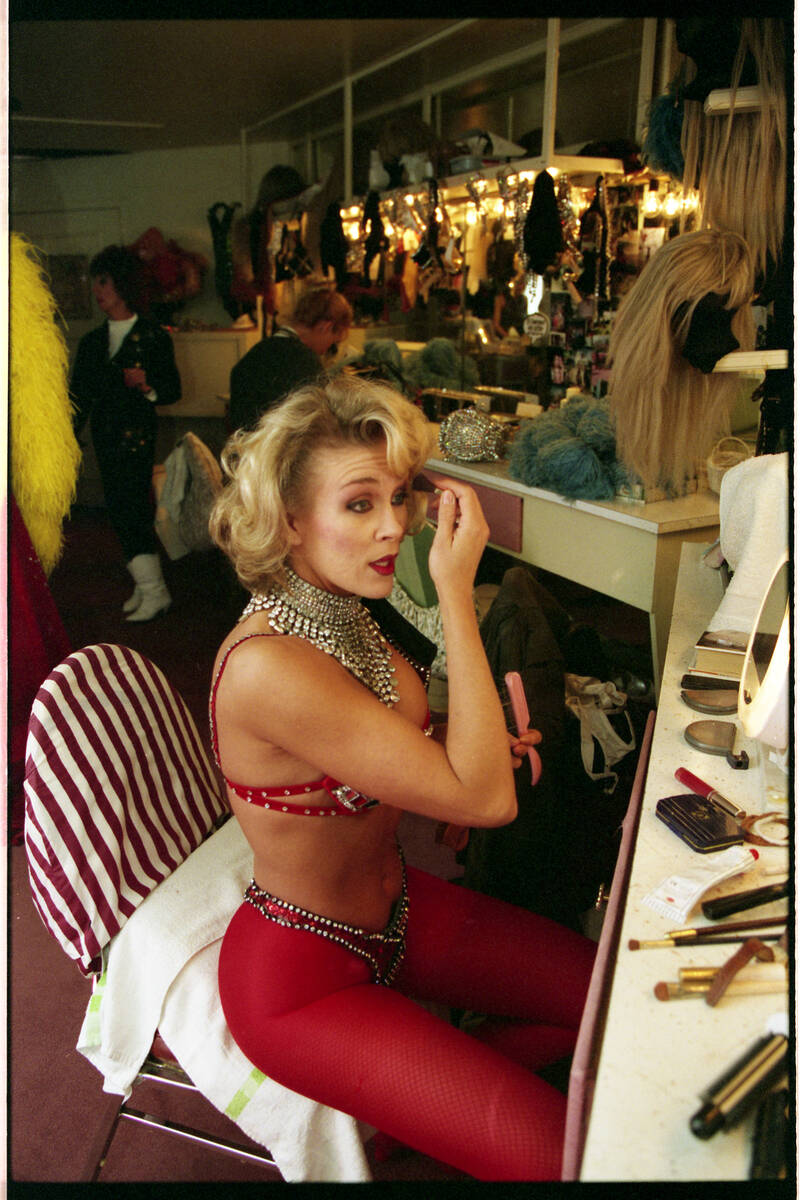 Showgirls from "Folies Bergere" getting ready for a show in their dressing room at th ...