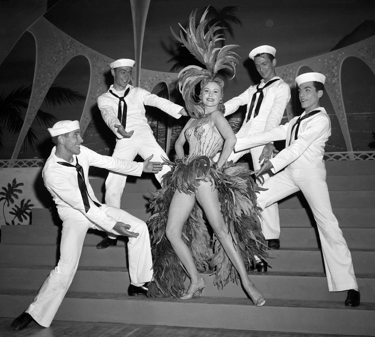 FILE - In this May 20, 1957 file photo, Actress Rhonda Fleming blossoms out as a singer and dan ...