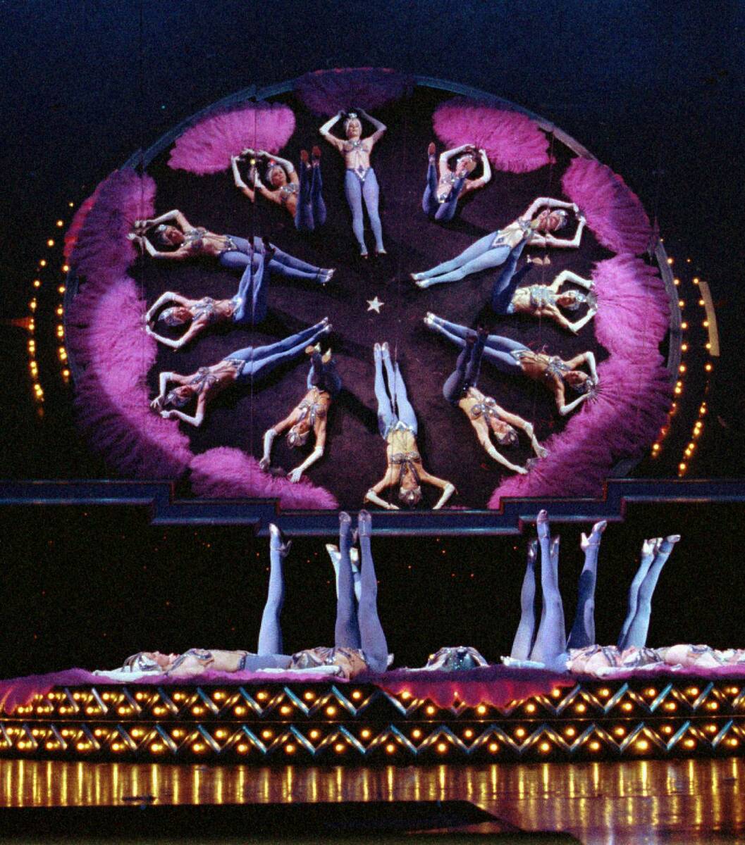 ** FILE ** In this April 14, 1997 file photo, showgirls perform one of their acts during a dres ...