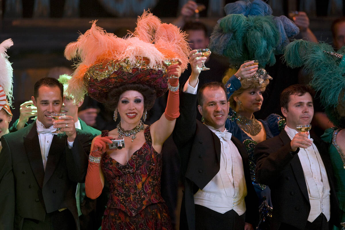RJ FILE*** K.M. CANNON/LAS VEGAS REVIEW-JOURNAL Folies Bergere cast members toast the audience ...