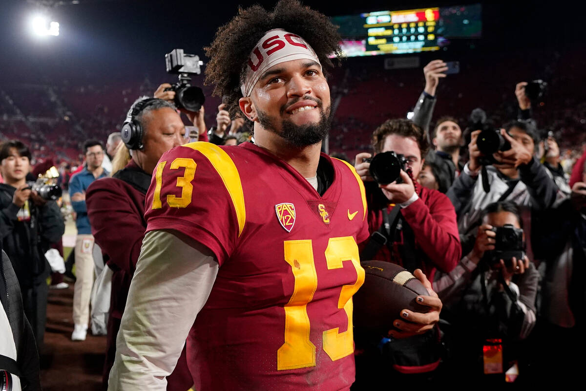 Southern California quarterback Caleb Williams smiles after USC defeated Notre Dame 38-27 an NC ...