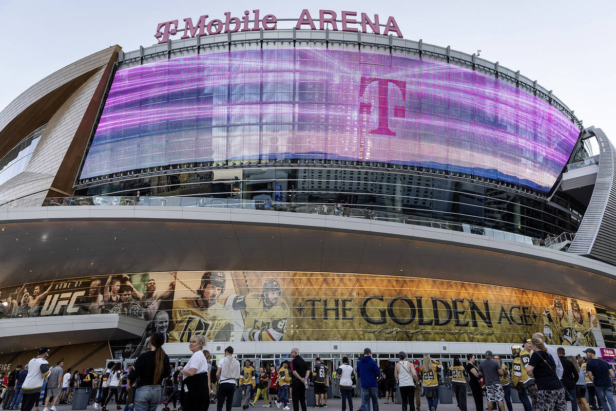 Fans file into T-Mobile Arena before an NHL hockey game between the Golden Knights and the Blac ...