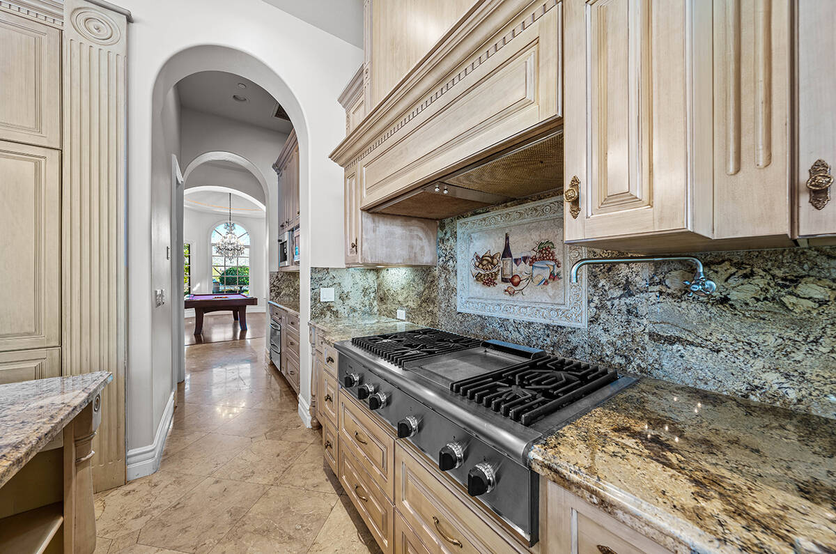 The kitchen features upgraded appliances. (Berkshire Hathaway Home Services)