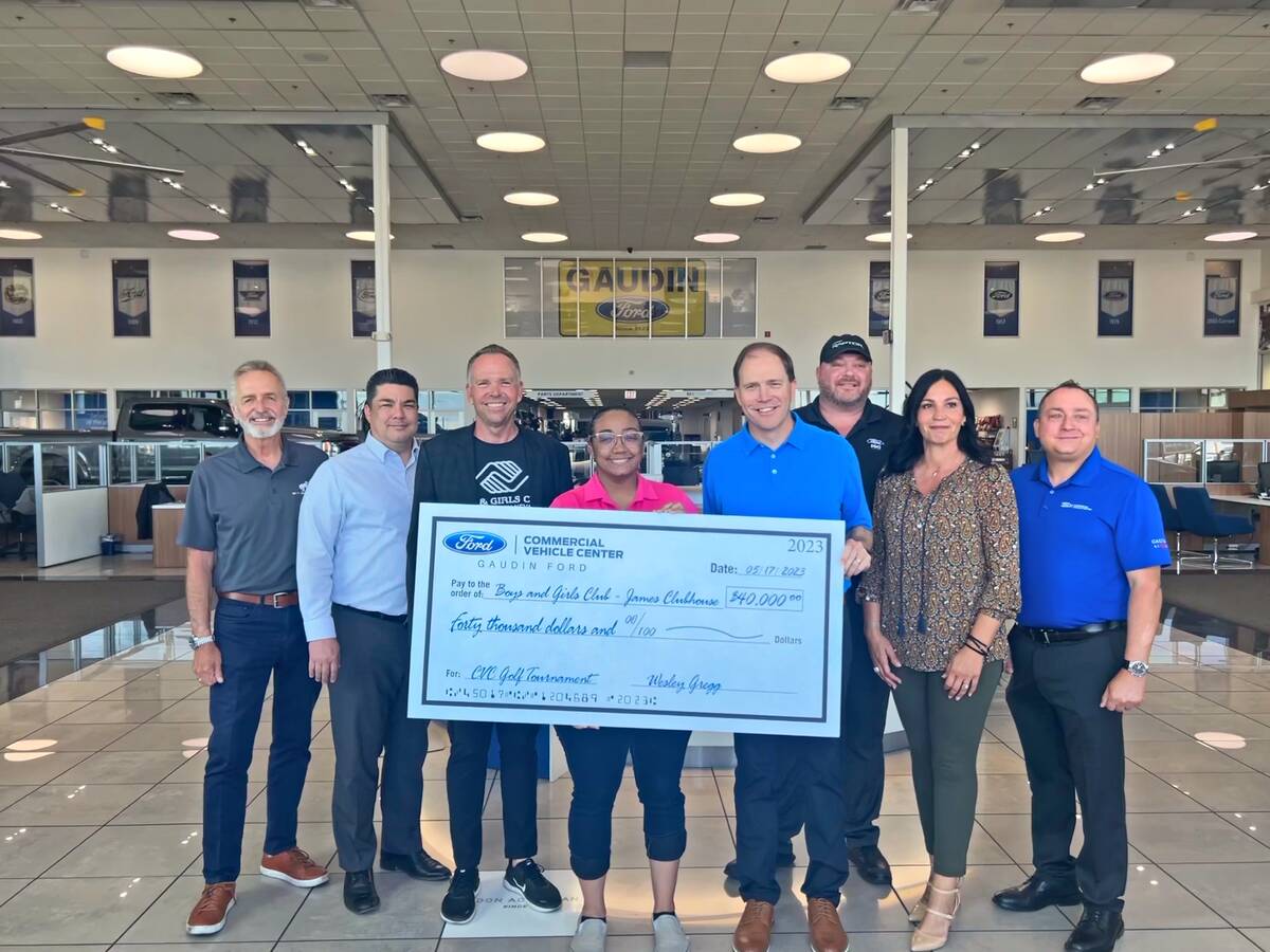Employees of Gaudin Ford Commercial Vehicle Department presented a $40,000 check to the preside ...