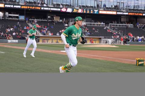 Oakland Athletics second baseman Zach Gelof takes the field before a baseball game against the ...