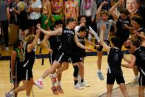 Shadow Ridge's Tyler Kirk (7) jumps with teammates before the Class 5A boys volleyball state ti ...