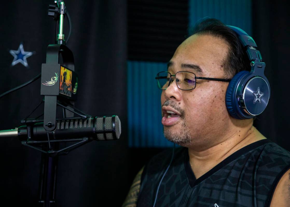 Paul Pu'ukani Sebala greets listeners on his radio station, Pipeline 2 Paradise Radio, in his h ...