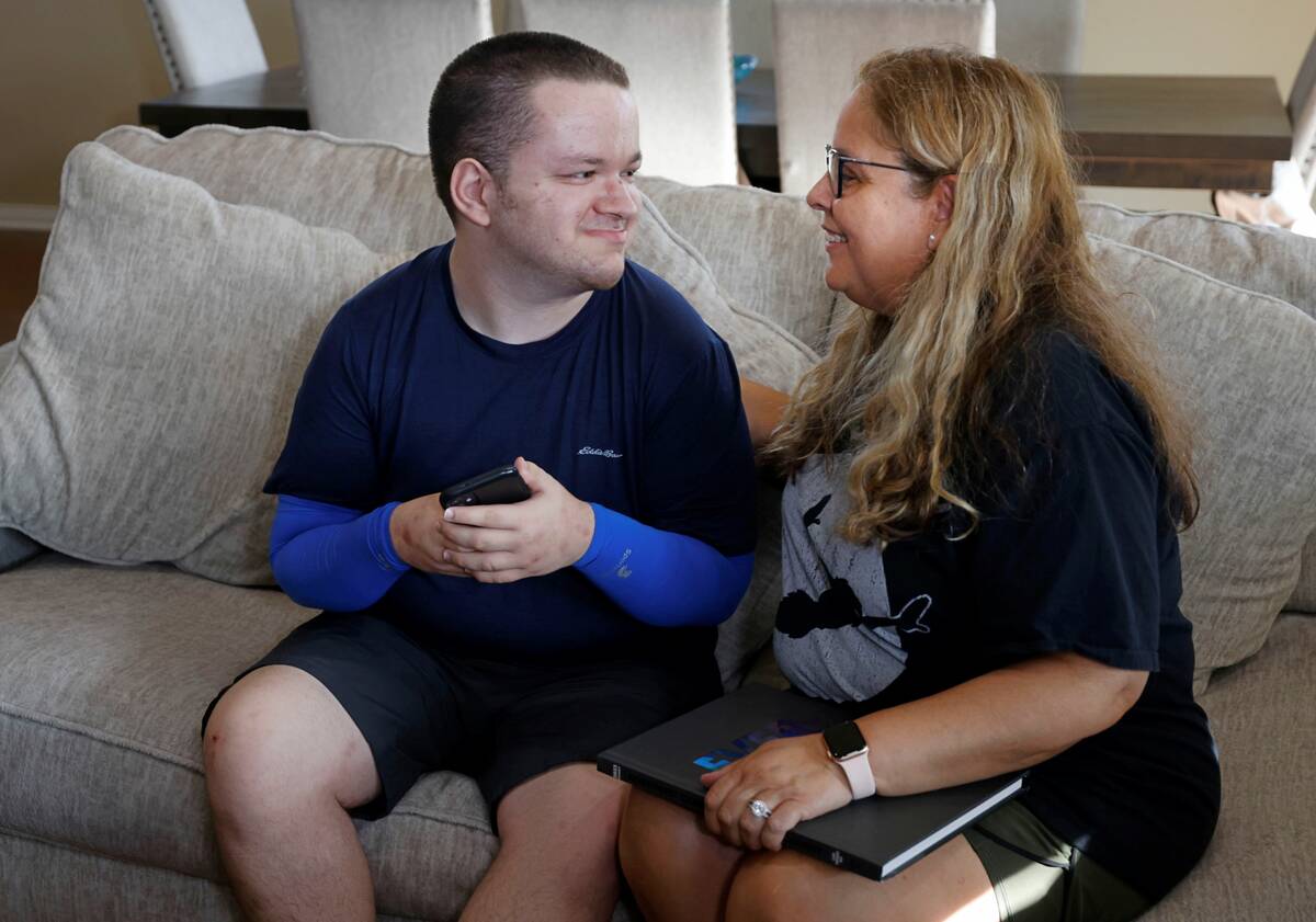 Mariela Azarpira talks with her son Samir, 22, in her house Thursday, June 1, 2023, in Las Vega ...