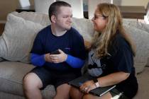 Mariela Azarpira talks with her son Samir, 22, in her house Thursday, June 1, 2023, in Las Vega ...