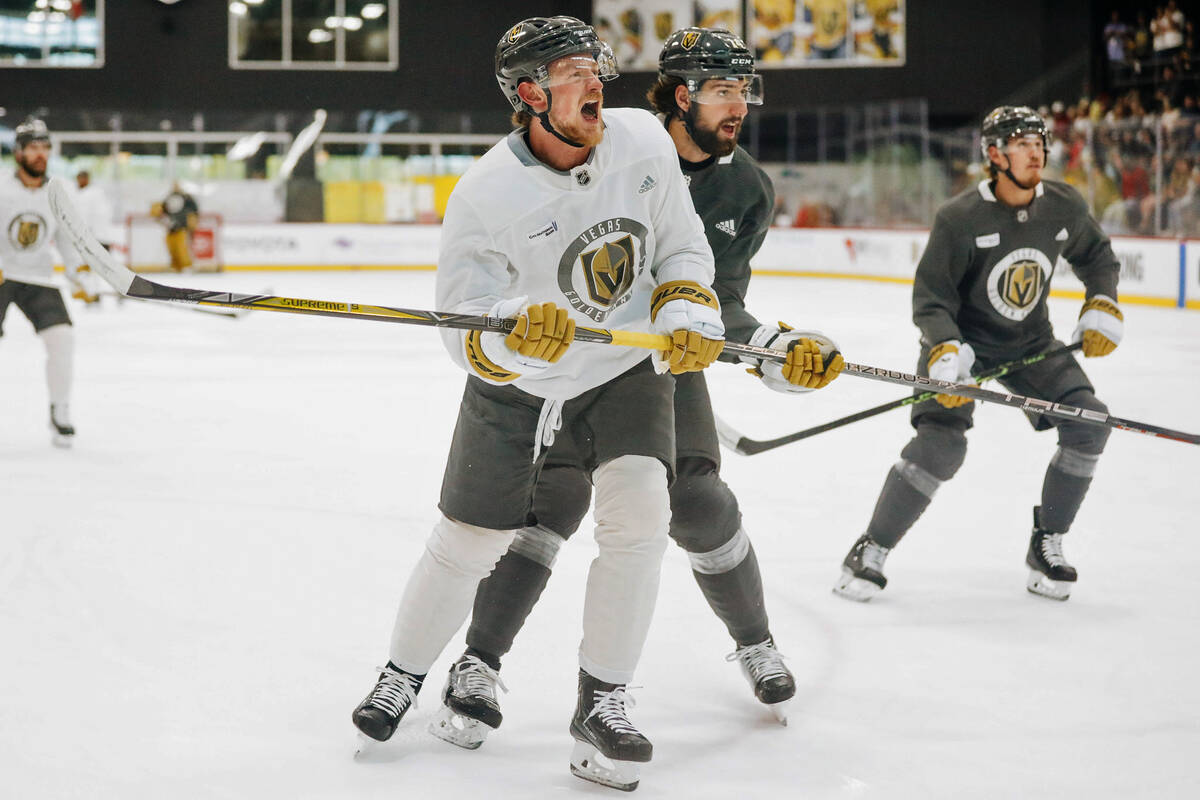 Golden Knights center Jack Eichel celebrates after shooting the puck into the net during practi ...