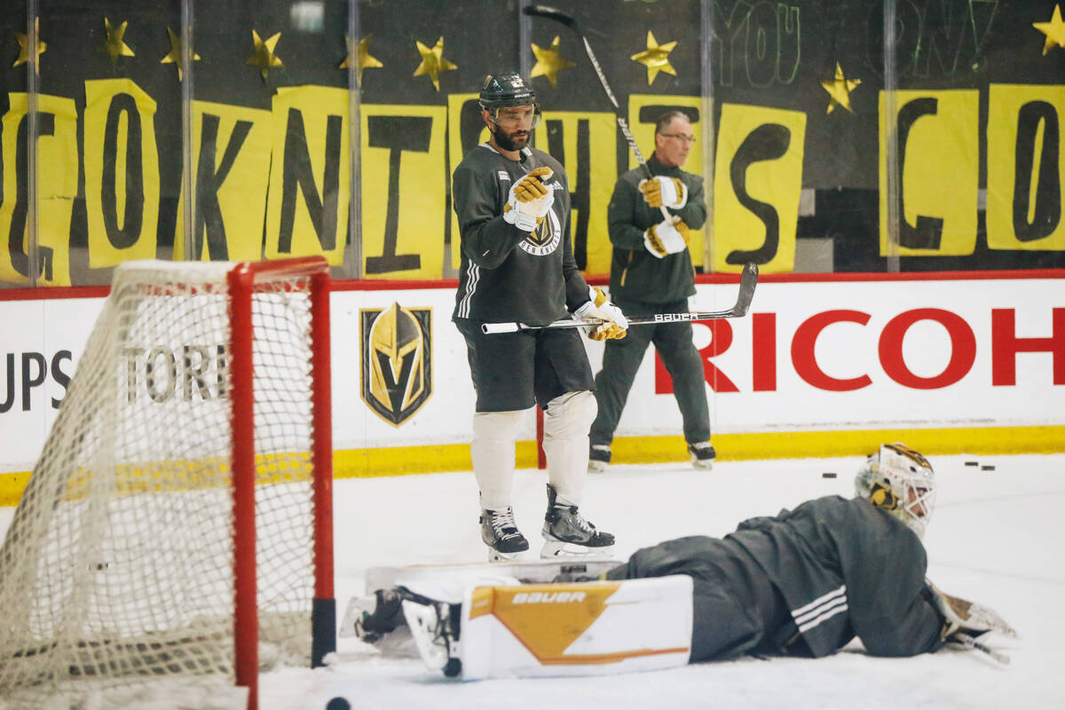 Golden Knights defenseman Alec Martinez aves his finger at a goalie who failed to keep a puck o ...