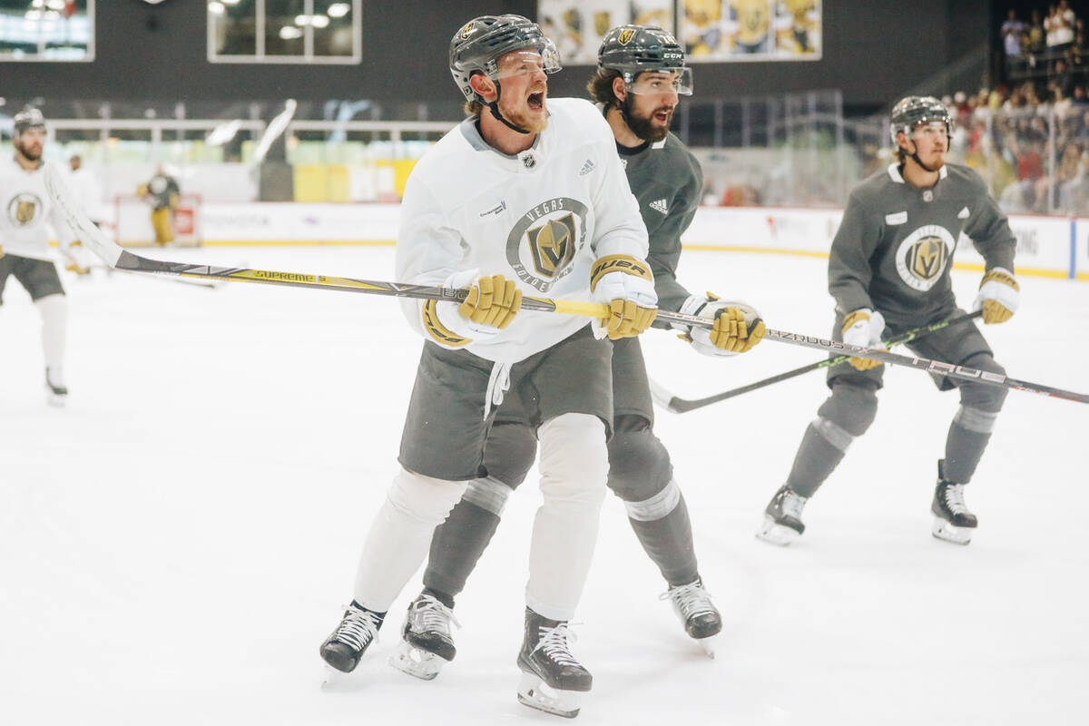 Golden Knights center Jack Eichel celebrates after shooting the puck into the net during practi ...