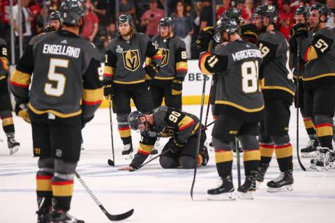 Golden Knights players react after losing in Game 5 of the Stanley Cup Final to the Washington ...