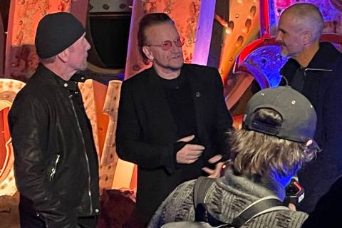 Bono and the Edge of U2 and DJ and multimedia presenter Zane Lowe visit the Neon Museum's Boney ...