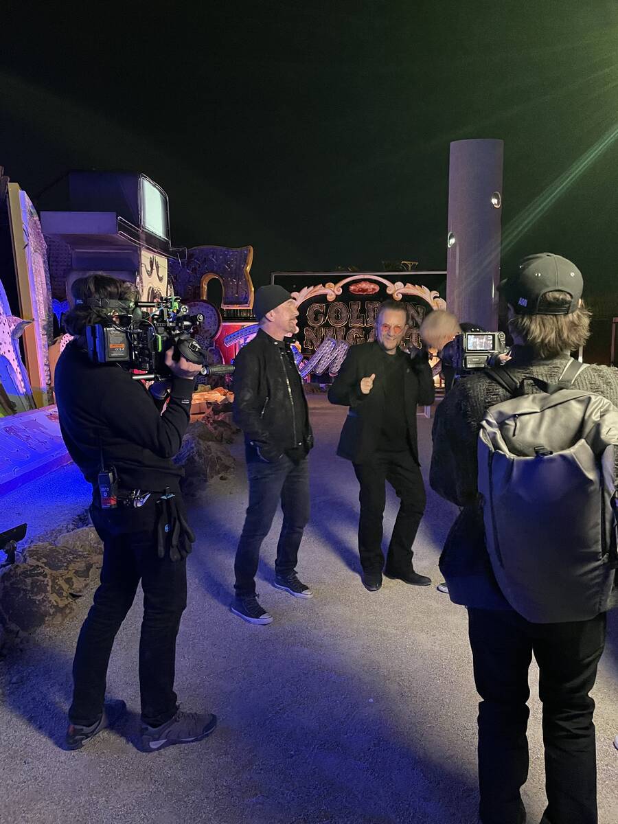 Bono and the Edge of U2 visit the Neon Museum's Boneyard vintage-sign attraction in Las Vegas o ...