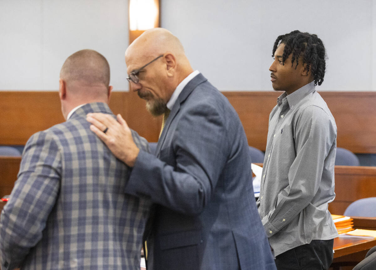 Former Bishop Gorman High School basketball standout Zaon Collins, right, who is accused of cau ...