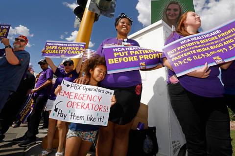 Sunrise Hospital registered nurse Jasmine Green, second from right and her daughter Aiyanna, 5, ...