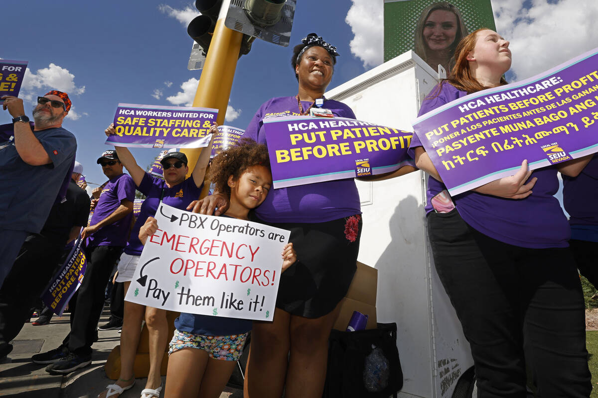 Sunrise Hospital registered nurse Jasmine Green, second from right and her daughter Aiyanna, 5, ...