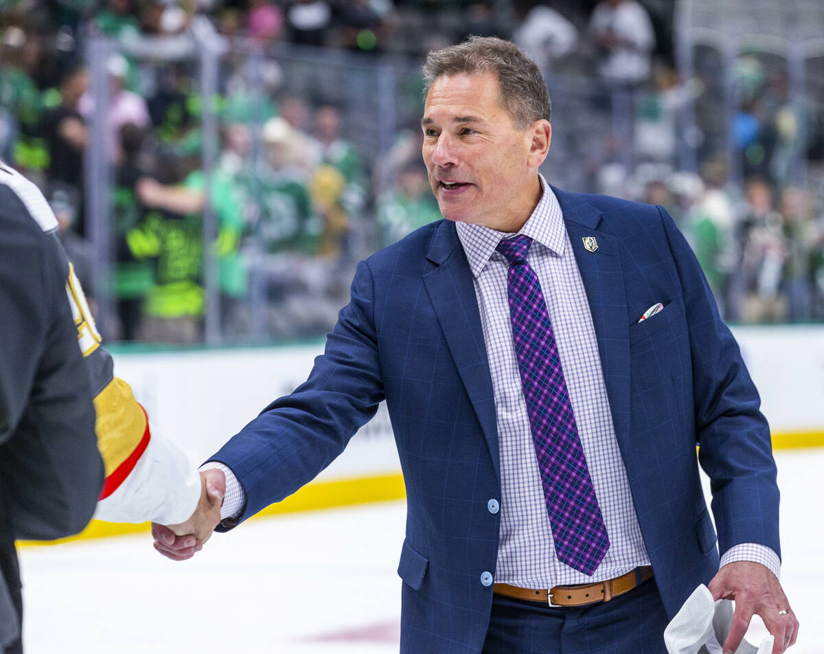 Golden Knights head coach Bruce Cassidy is congratulated on the ice after defeating the Dallas ...