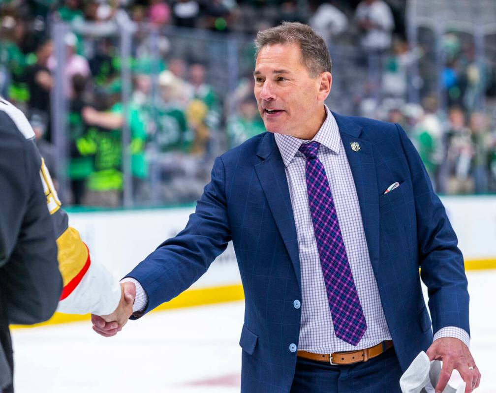 Golden Knights head coach Bruce Cassidy is congratulated on the ice after defeating the Dallas ...