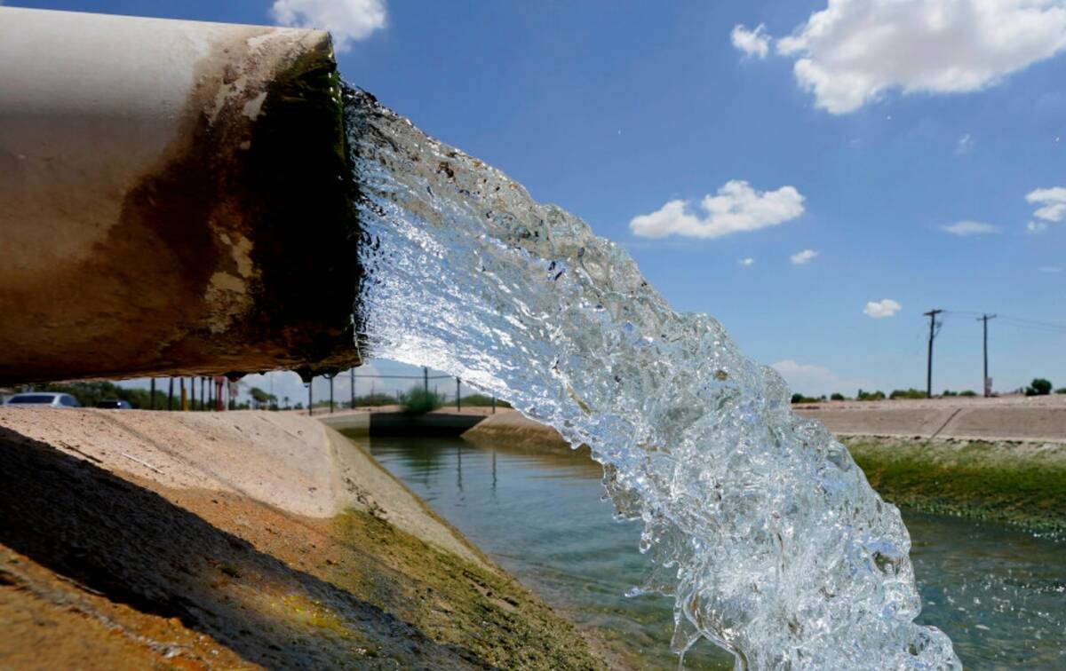 Water from the Colorado River diverted through the Central Arizona Project fills an irrigation ...