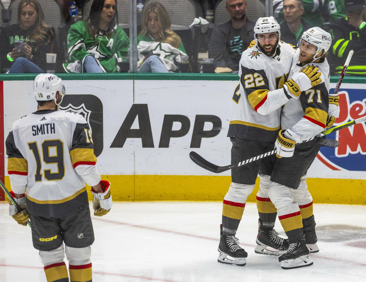 Golden Knights center William Karlsson (71) and right wing Michael Amadio (22) celebrate a scor ...